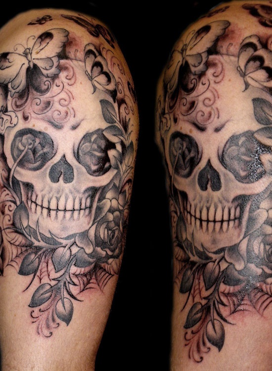skull and butterflies tattoo