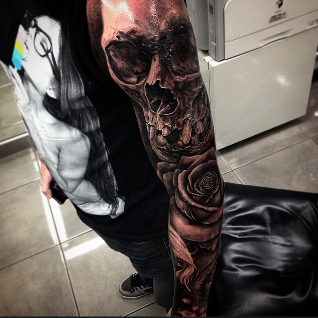 Skull arm Tattoo by Drew Apicture